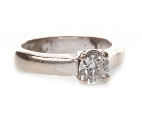 DIAMOND SOLITAIRE RING, the round brilliant cut diamond of approximately 0.65 carats, unmarked, size L, 5.9g
