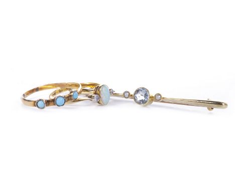 OPAL AND DIAMOND RING, set with a central oval opal 6mm long, flanked by two old round brilliant cut diamonds, marked 18CT, s