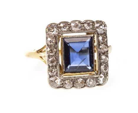 EARLY TWENTIETH SAPPHIRE AND DIAMOND RING, the square step cut sapphire of approximately 1.50 carats, within a halo of old cu