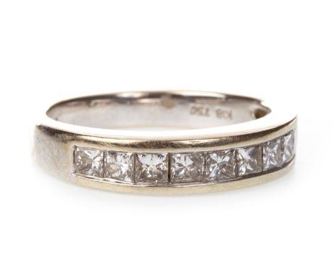 DIAMOND HALF ETERNITY RING, set with nine princess cut diamonds totalling approximately 0.90 carats, marked K18 and 750, size