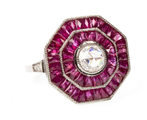 RUBY AND DIAMOND TARGET RING, the octagonal bezel set with a central rose cut diamond of approximately 0.60 carats, within a 