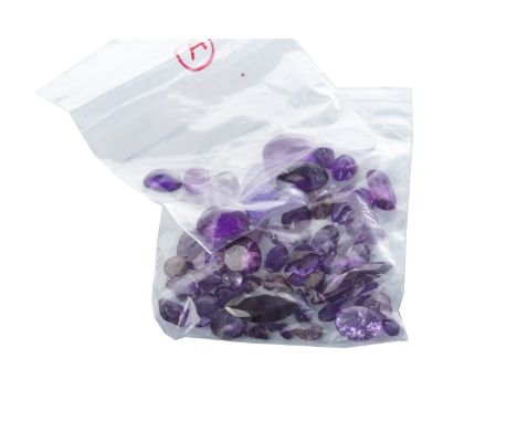 GROUP OF UNMOUNTED GEMS, including some possibly amethyst and several cabochon cut opaque lilac gems