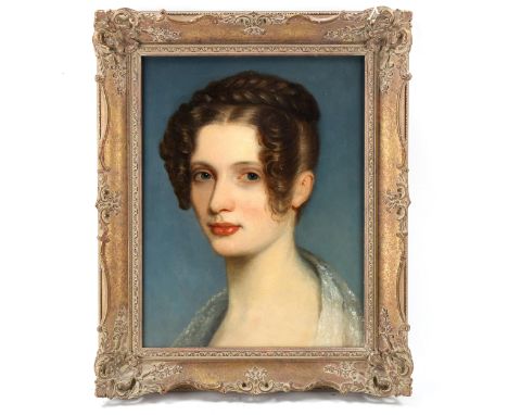An early 19th century oil on canvas laid on board, head portrait of a young woman, unsigned, 38cm x 28cm, framedSigns of over