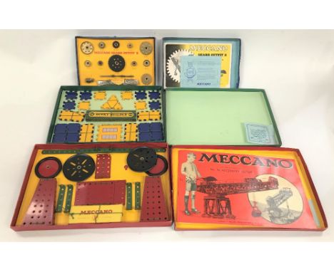 Meccano gears outfit 'A' with booklet; together with a Dinky builder accessory outfit 1A and Meccano accessory outfit 3A with