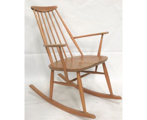 A 1960s Ercol blonde elm 'Goldsmith' rocker chair.