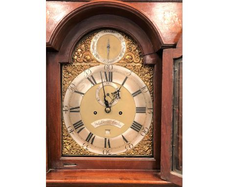 An eight day long case clock, the 12in brass arched dial with silvered chaptering signed JNO Garth, London, within mahogany i