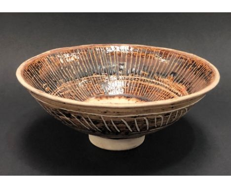 A Studio Pottery porcelain bowl with brown glaze and incised line decoration in the style of Lucie Rie, impressed potter's se