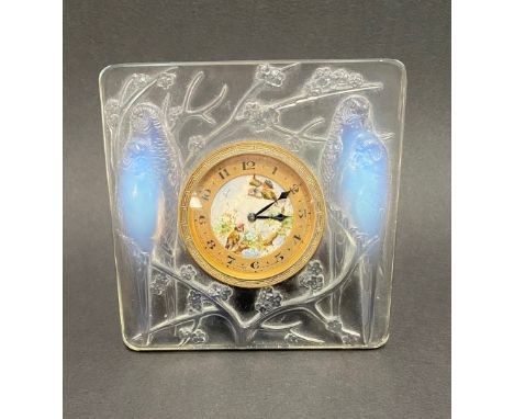 Rare Lalique glass 'Inseperables' clock, decorated with four budgerigar amongst prunus branches, with original eight day bras