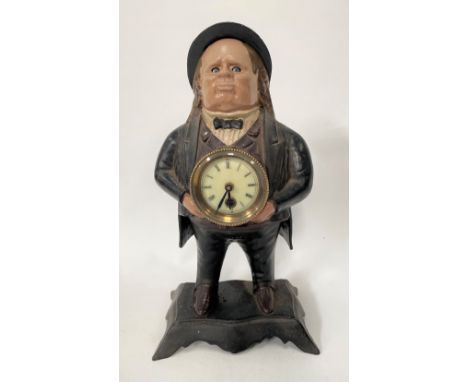 A Bradley &amp; Hubbard novelty John Ball moving eye cast iron clock case with quartz movement, height 38cm.