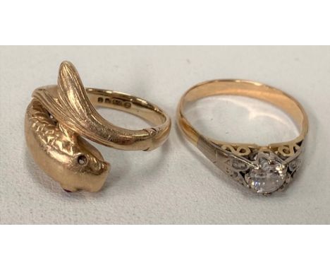 A 9ct hallmarked fish design ring, with inset ruby eye, together with a white stone set solitaire ring, weight overall 6.6g a