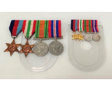 A set of four WWII retrospectively issued medals by J &amp; A Sanderson Remenham, Henley on Thames; together with a set of fo