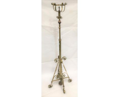 A Victorian brass telescopic oil standard lamp with patent stamp and with copper mounted rings and weighted base, possibly by