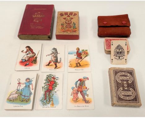 Four packs of playing cards, including Waddington's Lexicon card game, Snap Pantomime series and Gallagher's Rich Dark Honeyd