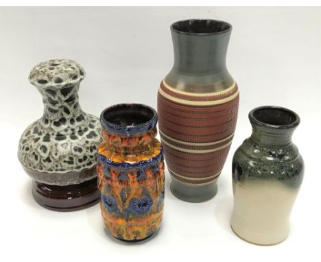 Three West German pottery vases, together with a table lamp base, largest height 30cm. 