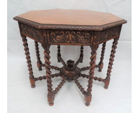 Victorian burr walnut veneered and solid walnut octagonal centre table, the burr veneered, feather and cross banded top with 