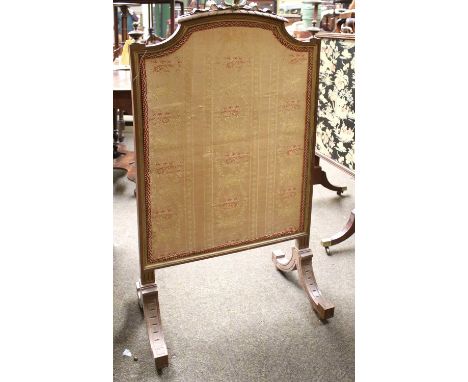 A 19th Century French Giltwood and Silk Firescreen, with ribbon-tied surmount, 58cm by 178cm, and A Similar Parcel-Gilt and N
