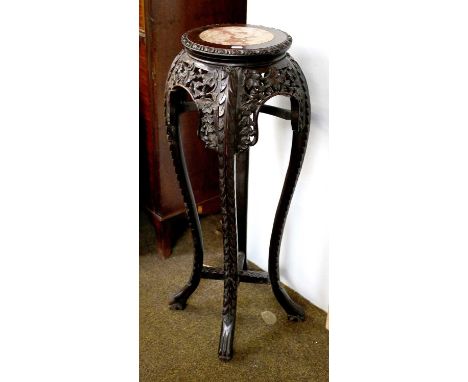 A Chinese Carved Hardwood Jardiniere Stand, 19th century, with marble inset top with carved and pierced frieze and raised on 