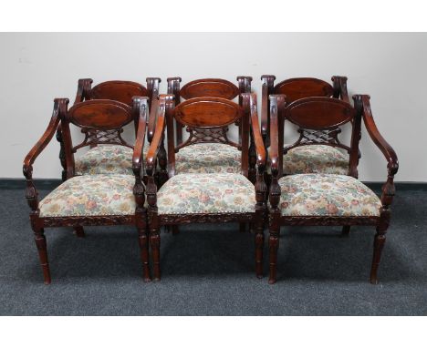 A set of six Victorian style armchairs upholstered in floral tapestry fabric  