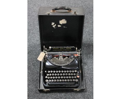 A cased Remington Victor T portable typewriter 