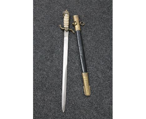 A copy of a naval dirk in leather scabbard