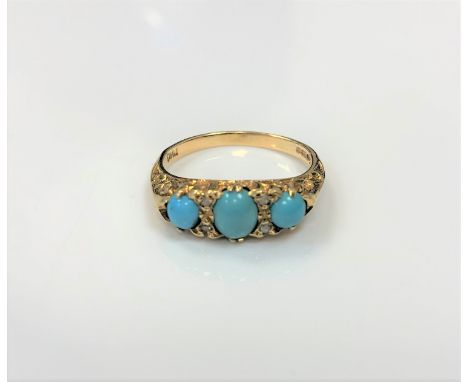 An 18ct gold diamond and turquoise ring, size N CONDITION REPORT: 4.1g