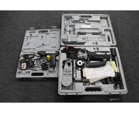 A cased Power Master hot glue gun together with a cased Rotozip Rebel 