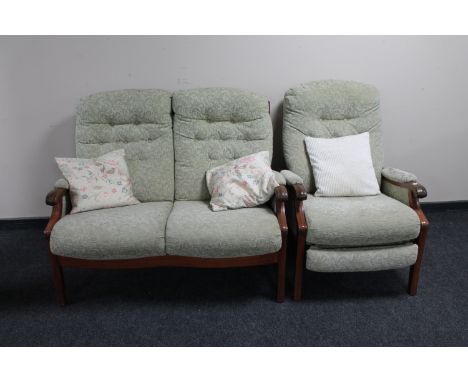 A two piece wood framed lounge suite upholstered in green buttoned fabric comprising two seater settee and manual reclining a