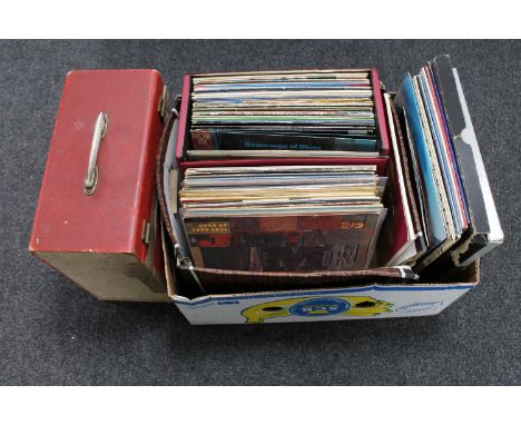 A box and a case of LP records, mainly pop and rock including The Beatles, Rolling stones, Cream etc 