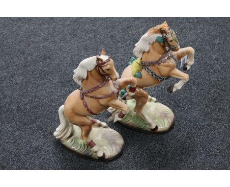 A pair of Melba rearing horses 