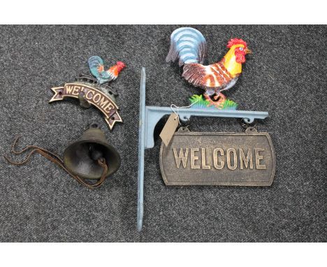 A cast iron cockerel wall bracket with welcome sign together with a further cast iron cockerel bracket with bell 