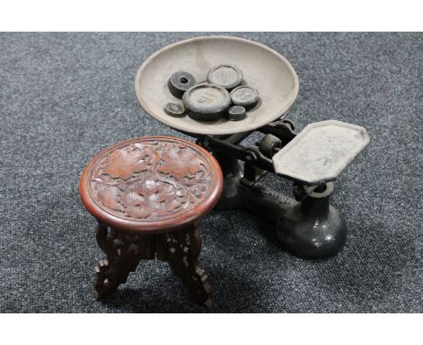 A set of vintage kitchen scales with weights together with a small folding hardwood table 