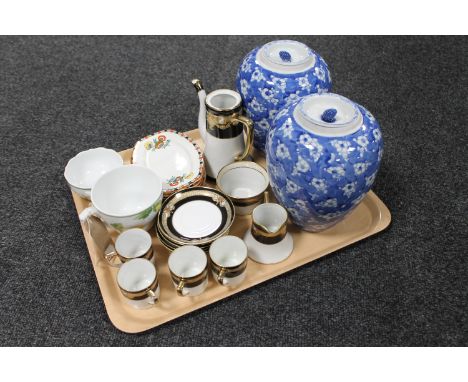 A tray of part Noritake tea service, pair of porcelain Chinese blue and white prunus vases, two West German tea cups 