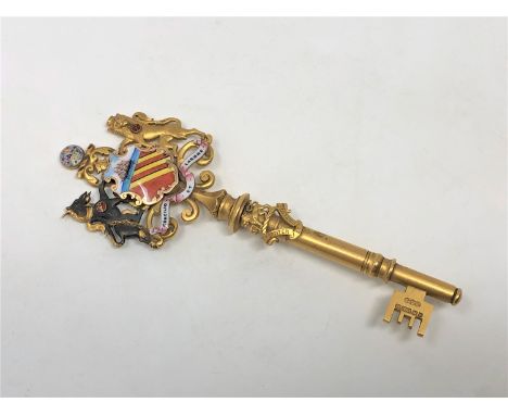 A superb quality 15ct gold and enamel presentation key, given to the right honourable Thomas Briggs, Lord Mayor of Manchester