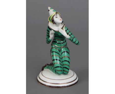 SCHLAGGENWALD Porzellanfigur ¨Pierrette¨ - 2. Hälfte 20. Jahrhunderts, Modell-Nummer K/429/119, auf einem Rundsockel knieende