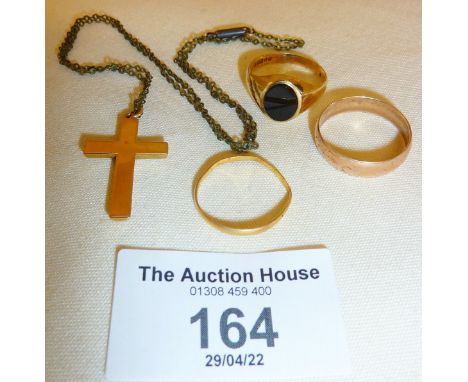 9ct gold crucifix, signet ring set with onyx approx. UK size P, 9ct rose gold wedding band, and another, scrap? Total approx 