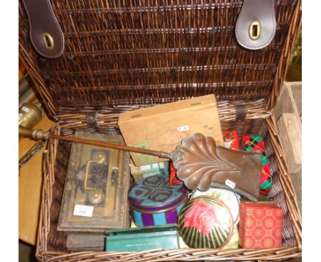 Wicker hamper of assorted vintage tins