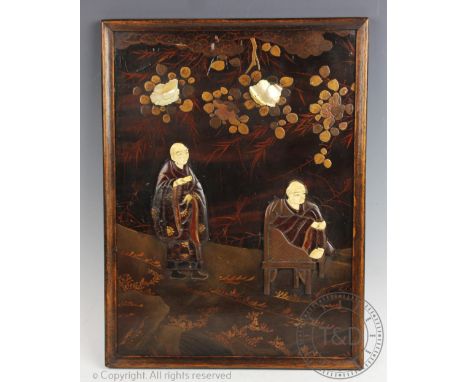 A Japanese shibayama style lacquered panel, Meiji period (1868-1912), with ivory and mother of pearl inlay, depicting two sag