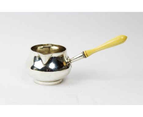 An Edwardian silver and ivory handled brandy pan, Goldsmiths &amp; Silversmiths Co Ltd, London 1909, of compressed circualr f