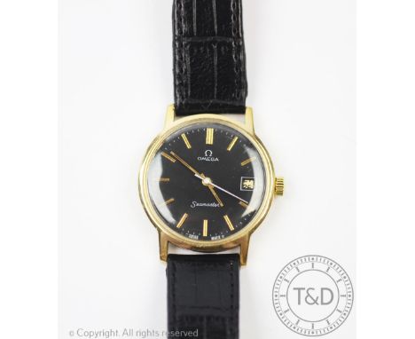 An Omega Seamaster wristwatch, the gold plated case enclosing black coloured dial with gilt batons, centre sweep seconds and 