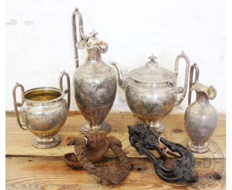 A Victorian silver plated four piece tea and coffee service, of Etruscan design, with ivory insulators, tallest 34cm, with tw