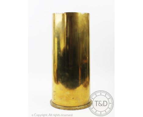 A large brass military shell case stick stand, stamped '3697' 'C.F.F' 'B 24' to the underside, 40cm high CONDITION REPORT: Th