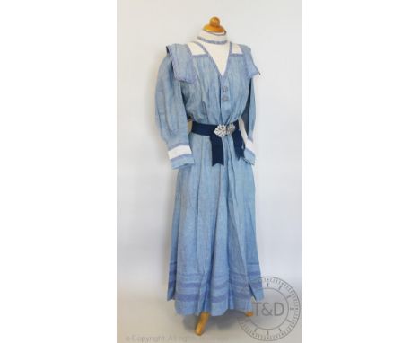 A sky blue summer bodice and skirt, circa 1908, the marled cotton with striped and lace insert panels to the collar and sleev