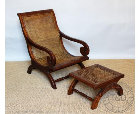 A Regency style hardwood library type chair, late 20th century, with caned seat, 90cm H, with a matching stool (2) CONDITION 