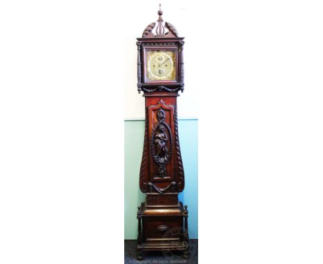 A late 19th / early 20th century century continental carved walnut and stained wood eight day longcase clock, c1900, with Rom