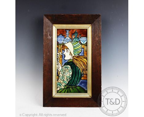 A pair of Art Nouveau tube lined tiles in the manner of Charlotte Rhead, each rectangular panel depicting a young lady drinki
