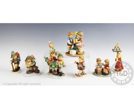 Four Goebel German figures titled 'The Professor' 1992 First Issue, 'Christmas by candlelight' 'Ooh my tooth' 1995 First Issu