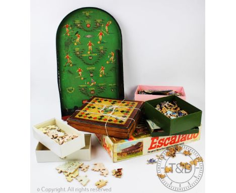 A collection of vintage games to include a Pin football board, Chad Valley Escalado and a quantity of jigsaw puzzles etc (Qty
