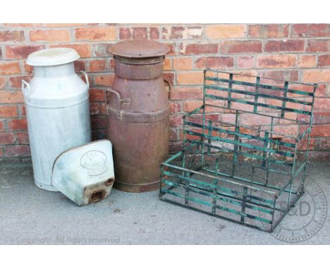 A Cadbury Bros milk churn and cover, 75cm H, with an aluminium milk churn and cover, a 'Salopian' iron hopper and a green pai
