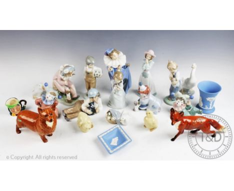 A selection of collectable ceramics, to include; a Beswick Fox and Corgi, a Lladro clown with puppy 5278, a Lladro girl and k