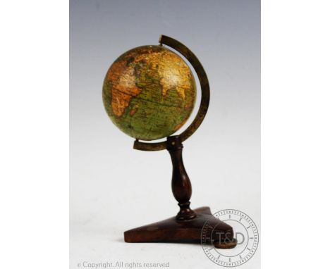 A late 19th century Wrenchs New Terrestrial Globe, the 8cm (approx) pocket globe on a rosewood and faux rosewood stand, (one 
